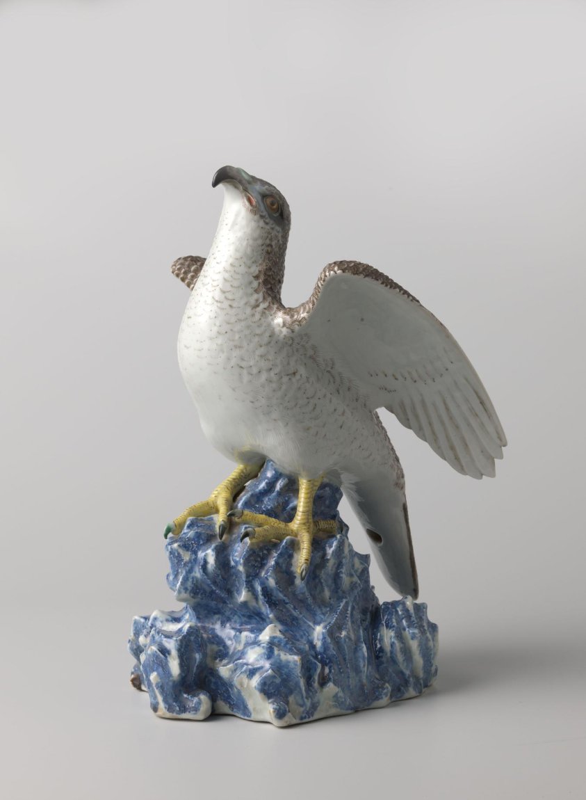 Figure of a bird of prey on a rock