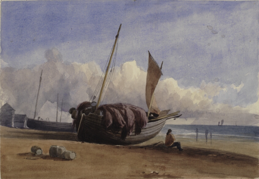 Beached fishing boat with seated fisherman